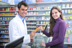 Doctor giving prescription to the customer